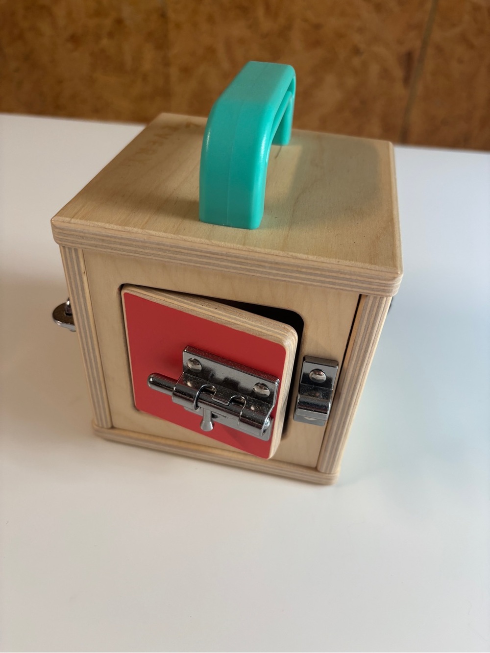 Wooden Lock Box Toy with Turquoise Handle and Red Door